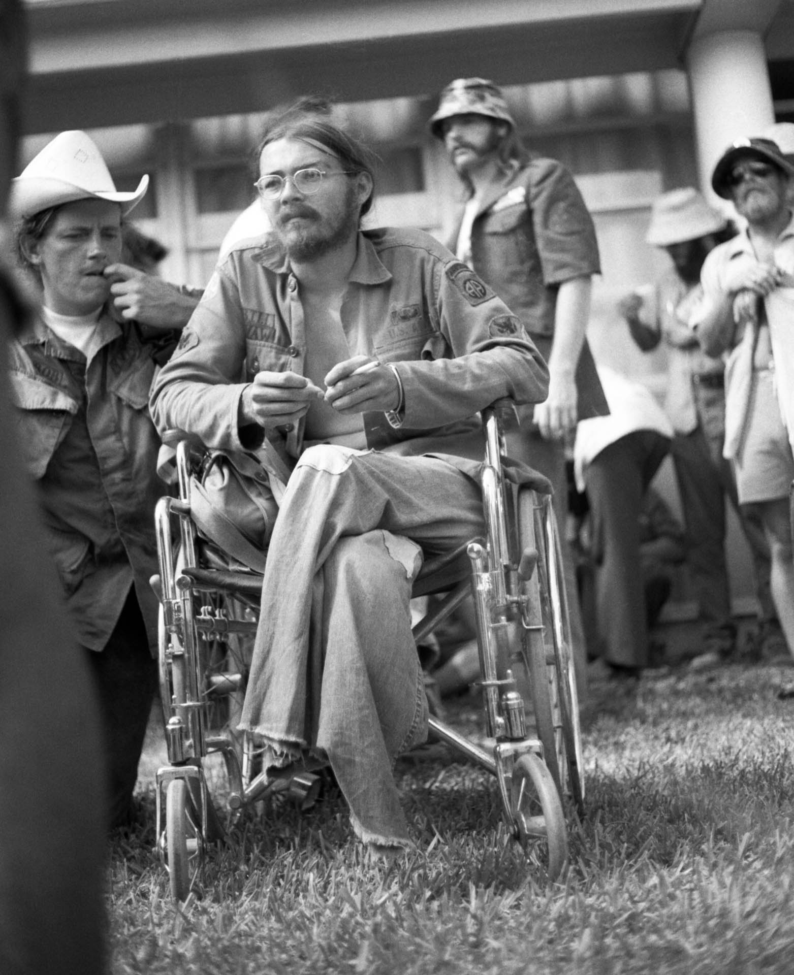 Wounded soldier from Vietnam Veterans Against the War (VVAW) in a wheelchair during protests against the RNC. He was one of over 200,000 U.S. casualties in that war.