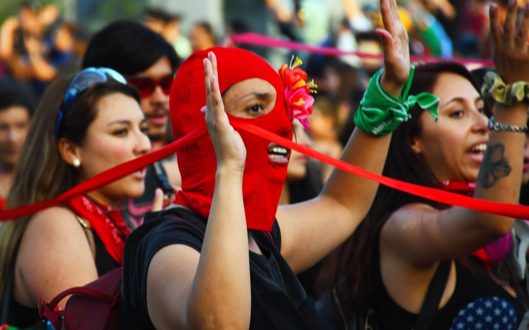 Photo of the Week – Red Masks in Resistance: Women Take Action