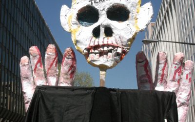Feature Photo by Orin Langelle – Puppet at World Bank Spring Meetings (2000)